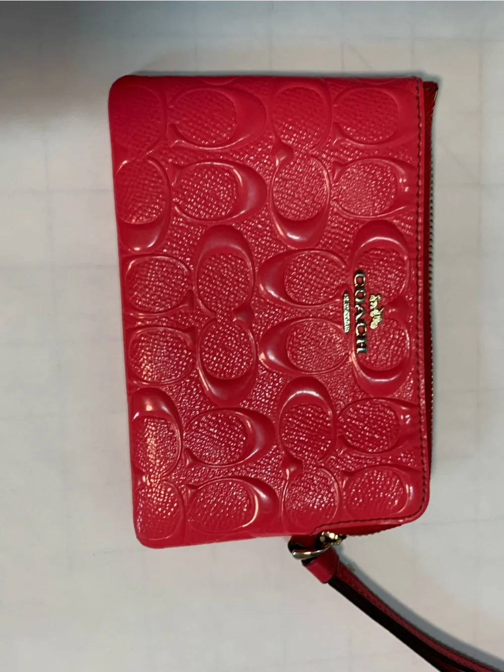 Coach PinkPatent Embossed Tablet Sleeve with Gold Logo